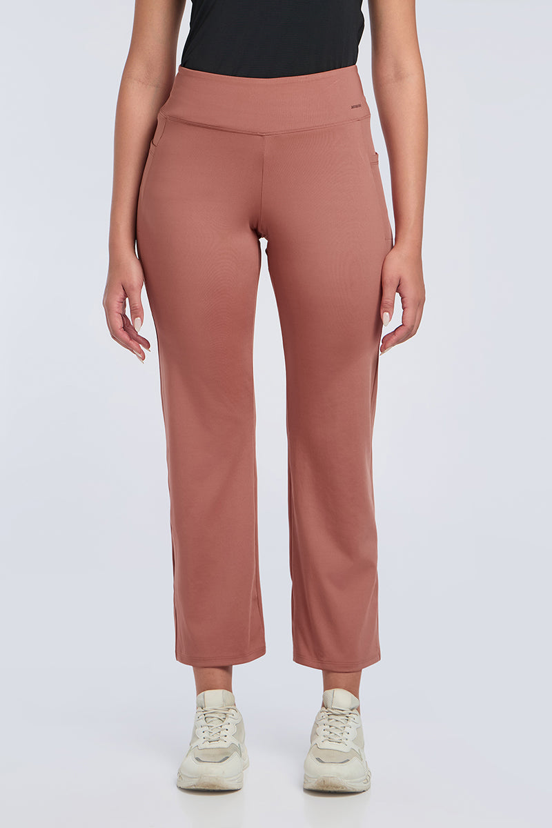 FLAUNT FLARED TRAVEL PANTS - Brick Dust - Image 1 of 6